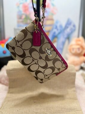 Coach Corner Zip Wristlet in Signature Canvas